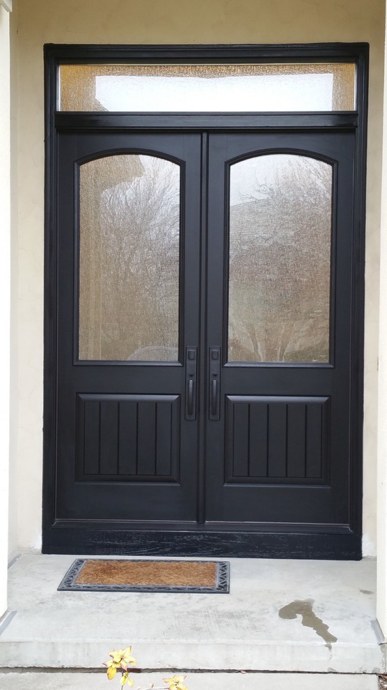 Mid-sized transitional front door photo in Chicago with a black front door