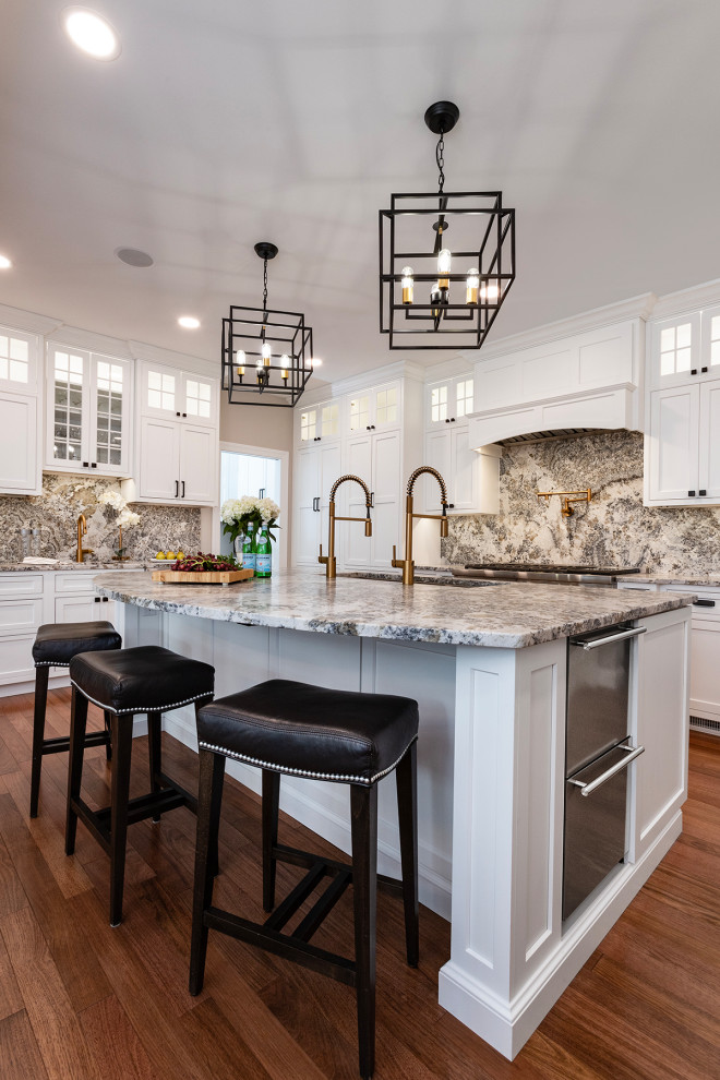 Inspiration for a large transitional u-shaped medium tone wood floor and red floor open concept kitchen remodel with an undermount sink, beaded inset cabinets, white cabinets, granite countertops, gray backsplash, granite backsplash, stainless steel appliances, an island and gray countertops