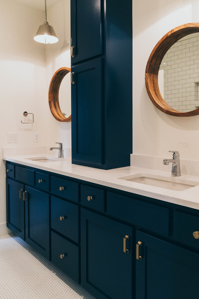 Inspiration for a transitional kids bathroom in Omaha with shaker cabinets, blue cabinets, an alcove tub, a two-piece toilet, white tile, an undermount sink, engineered quartz benchtops, a shower curtain, white benchtops and a shower/bathtub combo.