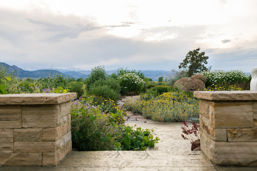 Design ideas for a country garden in Denver with a garden path and natural stone pavers.