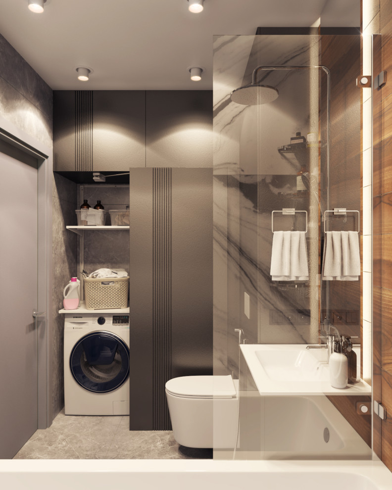 Foto på ett mellanstort vit en-suite badrum, med släta luckor, svarta skåp, ett undermonterat badkar, en dusch/badkar-kombination, en vägghängd toalettstol, grå kakel, keramikplattor, grå väggar, klinkergolv i porslin, ett integrerad handfat, bänkskiva i akrylsten, grått golv och dusch med duschdraperi