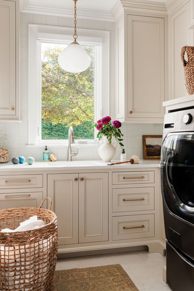 Example of a classic laundry room design in Other