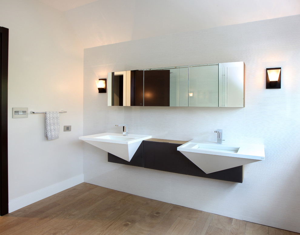 Inspiration for an expansive contemporary 3/4 bathroom in Other with a wall-mount sink, medium hardwood floors, flat-panel cabinets, white tile, ceramic tile, white walls and engineered quartz benchtops.