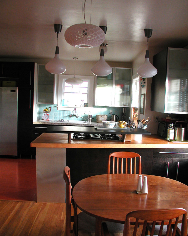 Photo of an eclectic kitchen in Portland.