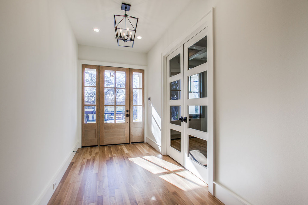 Transitional entryway photo in Dallas