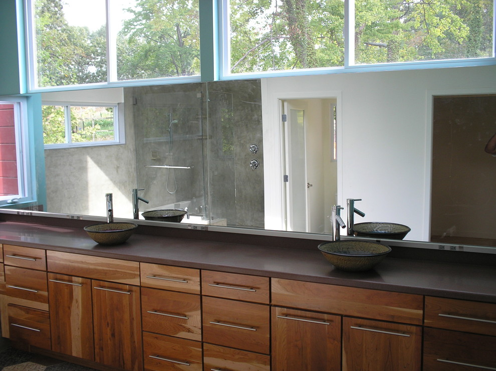 Inspiration for an expansive contemporary master bathroom in Raleigh with a vessel sink, flat-panel cabinets, medium wood cabinets and blue walls.