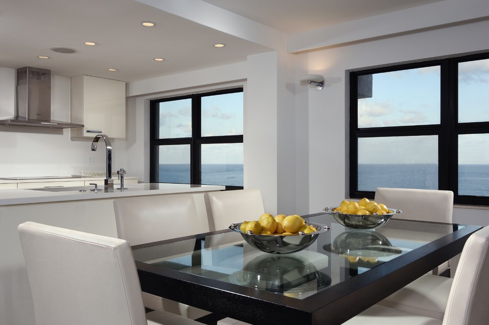 Mid-sized contemporary open plan dining in Miami with white walls, porcelain floors, no fireplace and white floor.