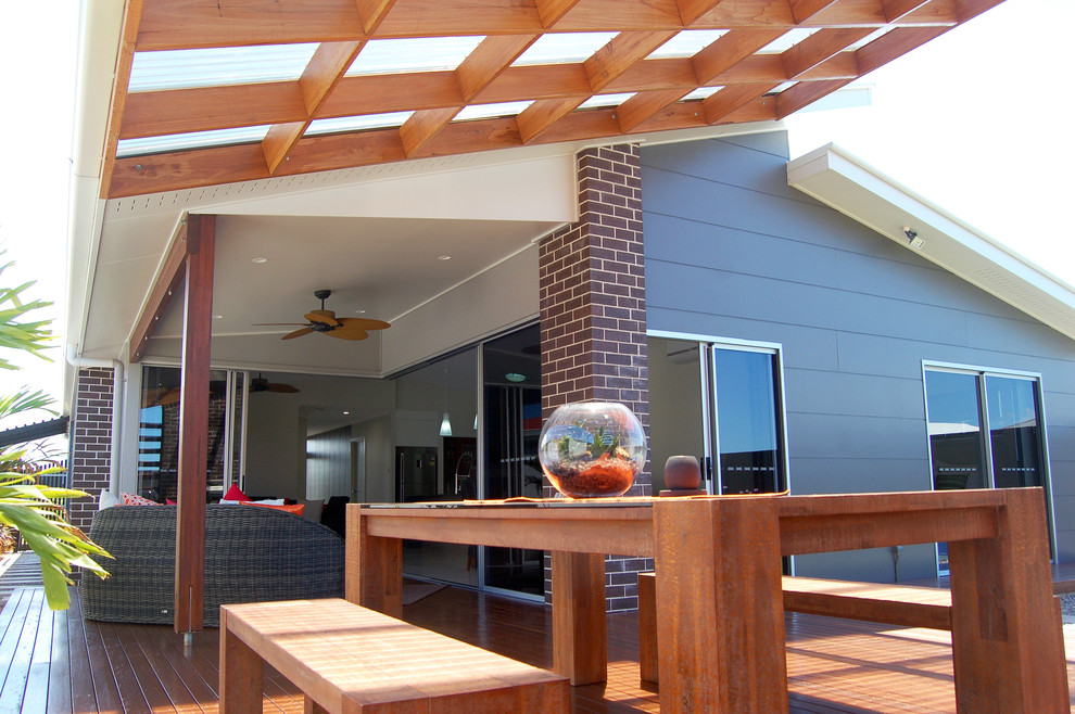Design ideas for a small contemporary backyard patio in Other with an outdoor kitchen, decking and a pergola.