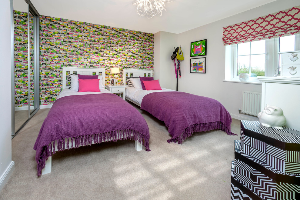 Photo of a transitional kids' bedroom for girls in Sussex with multi-coloured walls and carpet.