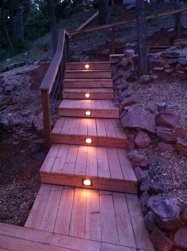 Inspiration for a small rustic backyard deck container garden remodel in Denver with no cover