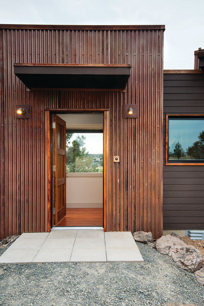 This is an example of an expansive country brown exterior in San Francisco with metal siding.