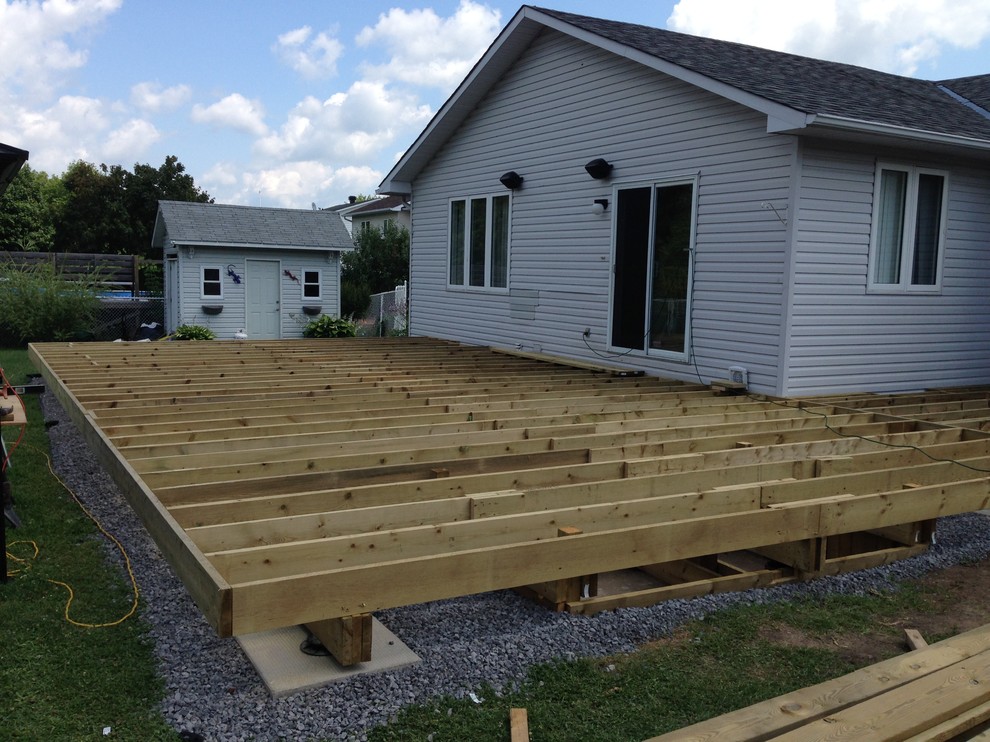 Example of a huge transitional backyard deck design