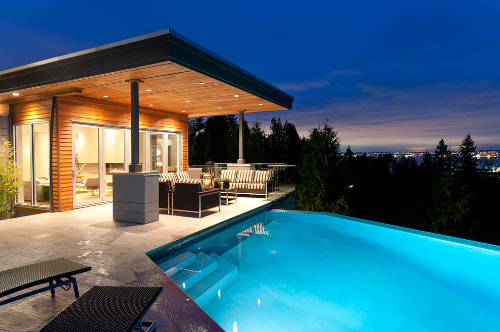 Photo of a contemporary infinity pool in Vancouver.