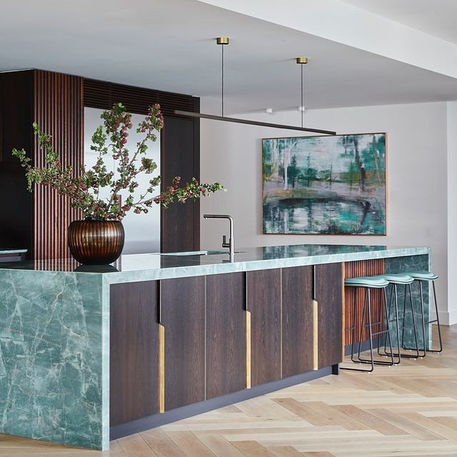 This is an example of a large contemporary galley open plan kitchen in Sydney with a submerged sink, flat-panel cabinets, dark wood cabinets, quartz worktops, green splashback, stone slab splashback, stainless steel appliances, an island and green worktops.