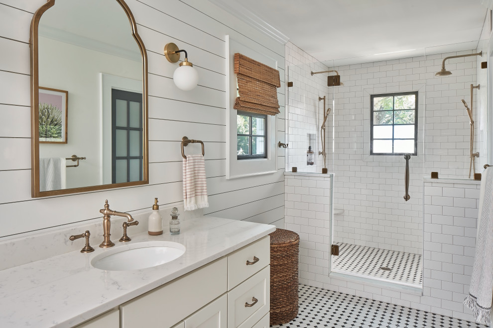 Double shower - mid-sized farmhouse master white tile and subway tile mosaic tile floor, white floor, double-sink and shiplap wall double shower idea in Charlotte with shaker cabinets, white cabinets, a two-piece toilet, white walls, an undermount sink, quartz countertops, a hinged shower door, white countertops, a niche and a freestanding vanity