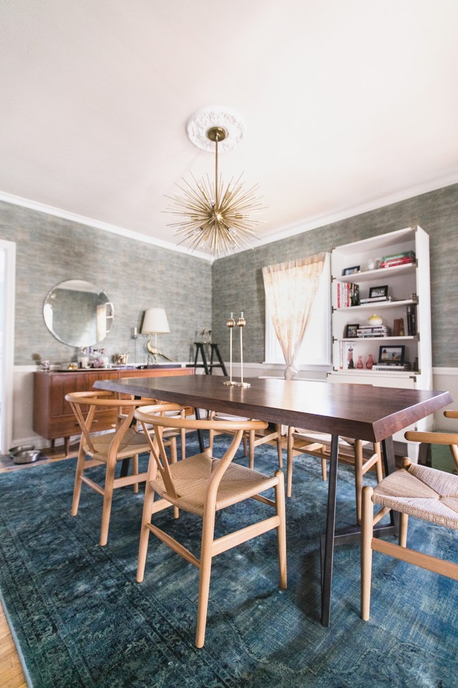 Photo of a mid-sized midcentury separate dining room in Philadelphia with blue walls, light hardwood floors, no fireplace and brown floor.