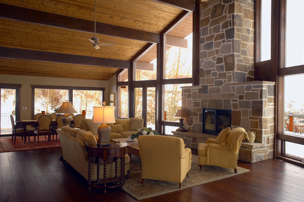 Inspiration for a large traditional formal open concept living room in Denver with beige walls, dark hardwood floors, a standard fireplace, a stone fireplace surround and no tv.