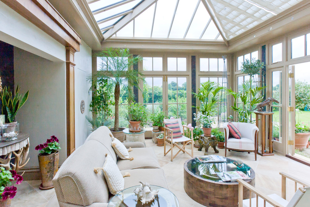 Photo of a large traditional sunroom in Other with travertine floors, no fireplace and a glass ceiling.