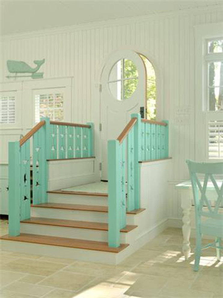 Design ideas for a tropical entryway in Tampa with a single front door and a white front door.