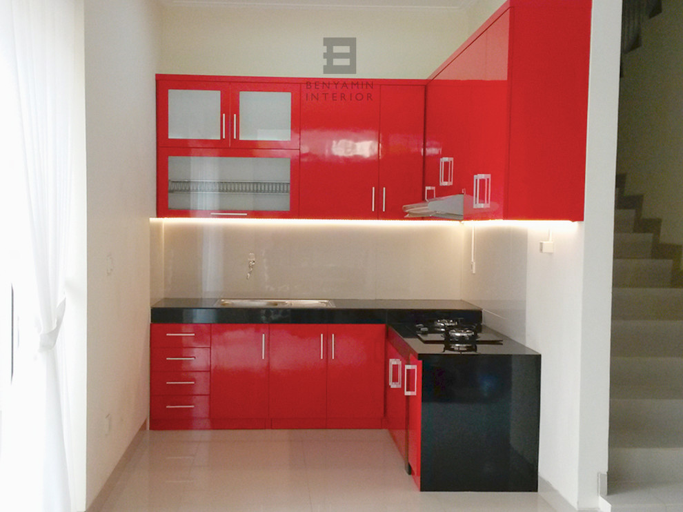 Inspiration for a small modern l-shaped ceramic tile enclosed kitchen remodel in Other with a single-bowl sink, flat-panel cabinets, red cabinets, granite countertops, gray backsplash, ceramic backsplash and no island