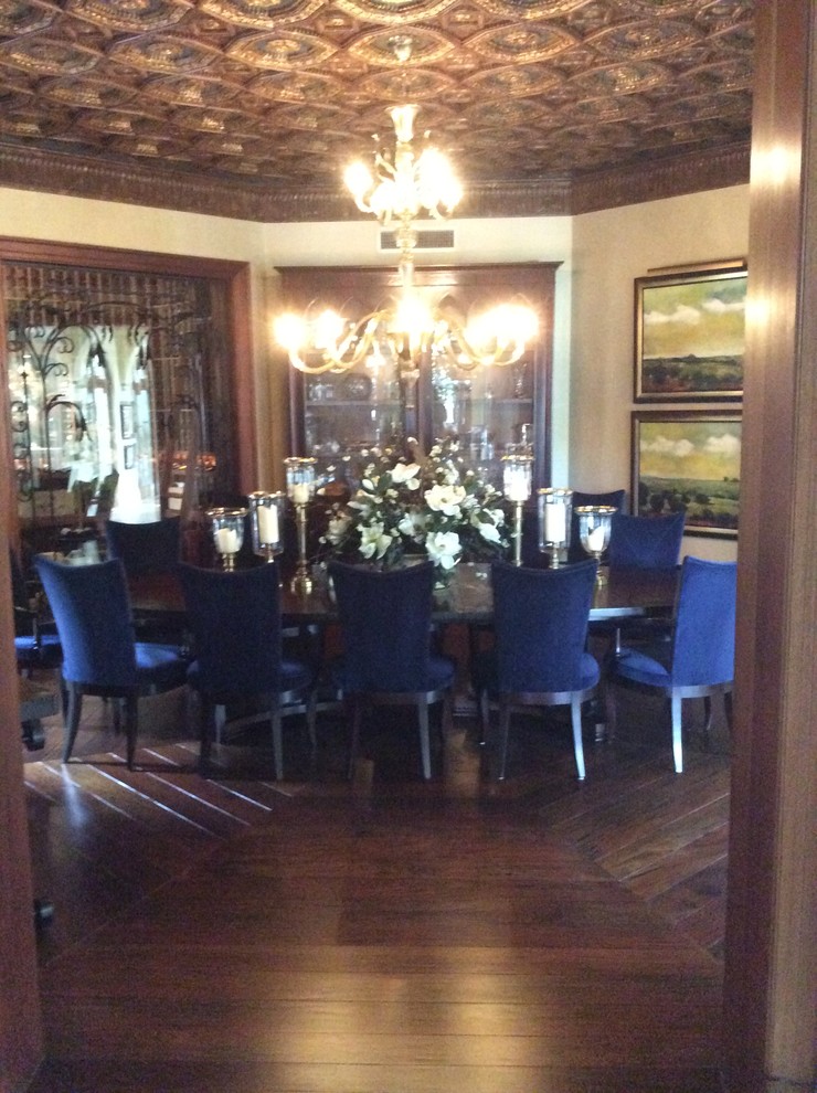Elegant dark wood floor dining room photo in Miami