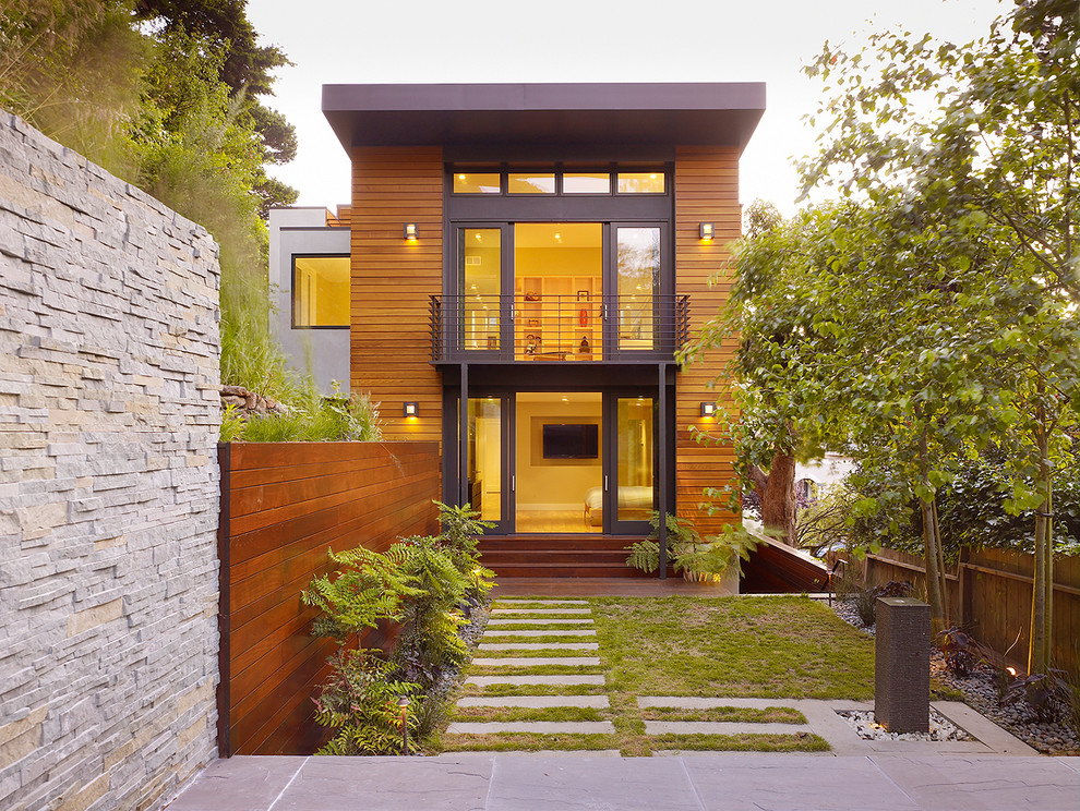 Design ideas for a contemporary exterior in San Francisco with mixed siding.