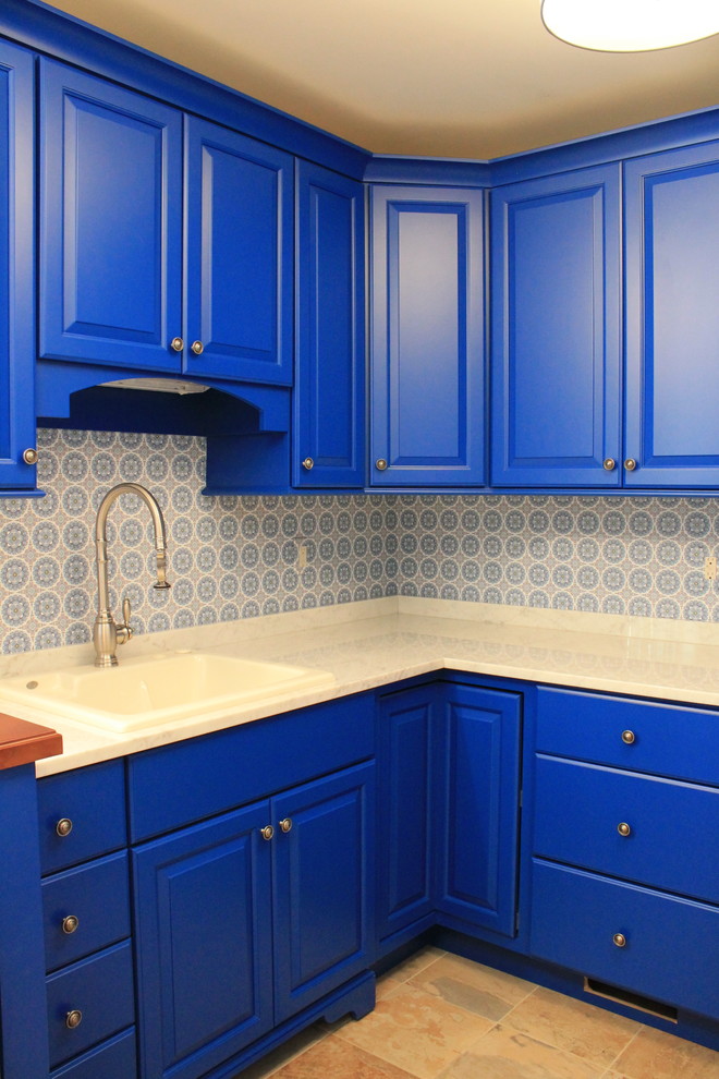 Laundry room in Other with blue cabinets and a side-by-side washer and dryer.