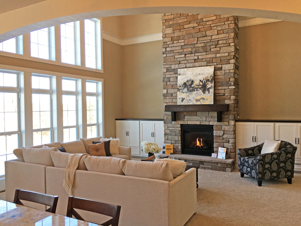 Design ideas for a large arts and crafts formal open concept living room in Other with beige walls, carpet, a standard fireplace, a stone fireplace surround and no tv.