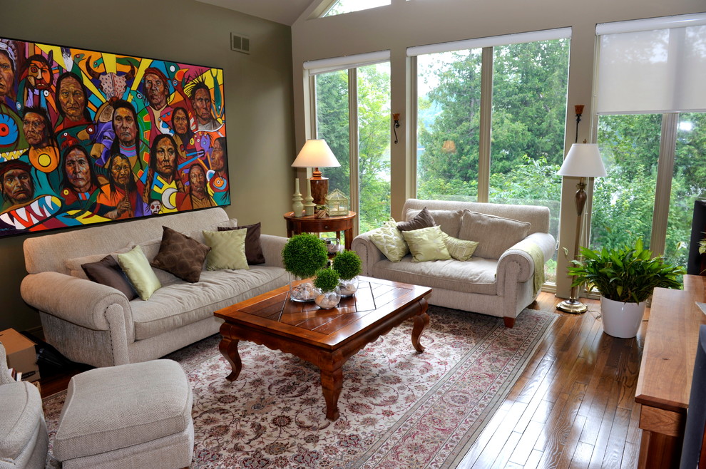 Photo of a traditional living room in Ottawa with grey walls.