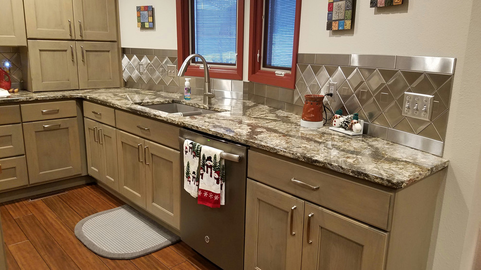 Example of a transitional kitchen design in Omaha