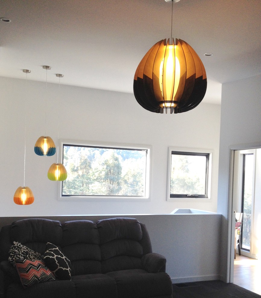 Modern formal enclosed living room in Hobart.