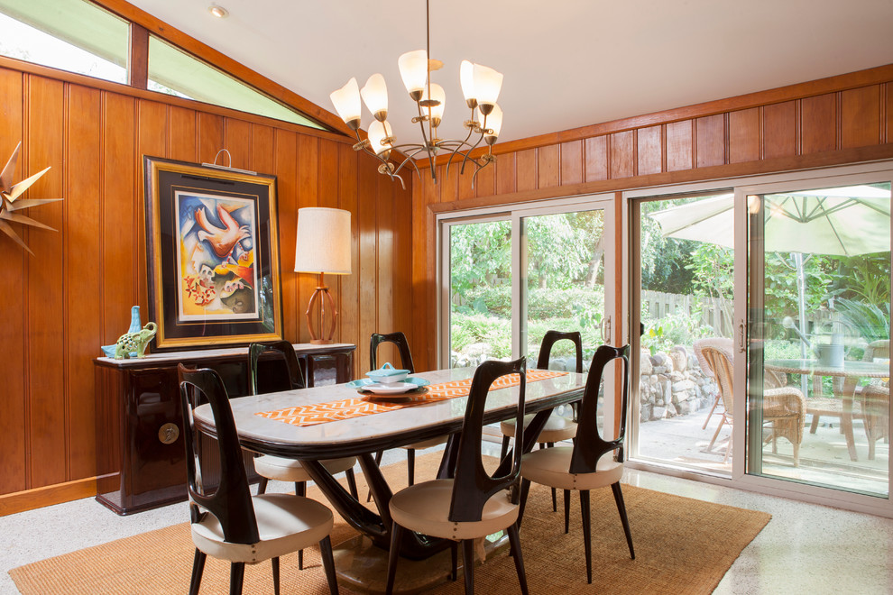 This is an example of a mid-sized midcentury dining room in Atlanta.