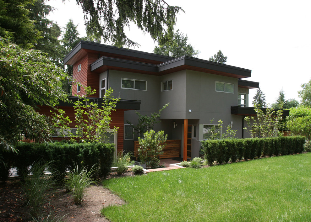 Inspiration for a contemporary exterior in Vancouver with wood siding.