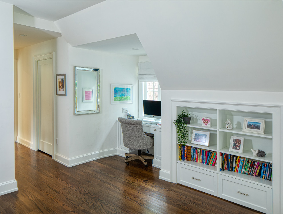 Large traditional teen’s room for girls in New York with white walls, medium hardwood flooring, brown floors, a vaulted ceiling and wallpapered walls.