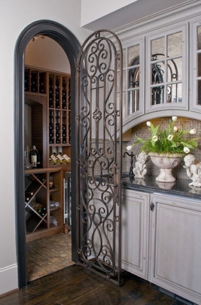 Inspiration for a mid-sized traditional wine cellar in Other with ceramic floors, diamond bins and beige floor.