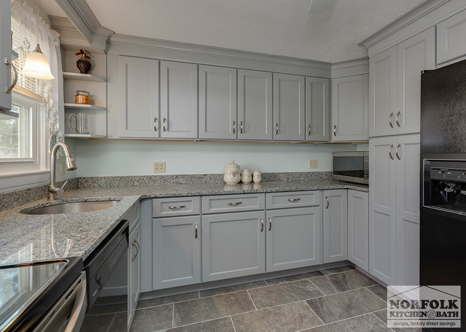 Home design - mid-sized transitional u-shaped home design idea in Boston with an undermount sink, shaker cabinets, gray cabinets, granite countertops, stainless steel appliances and no island