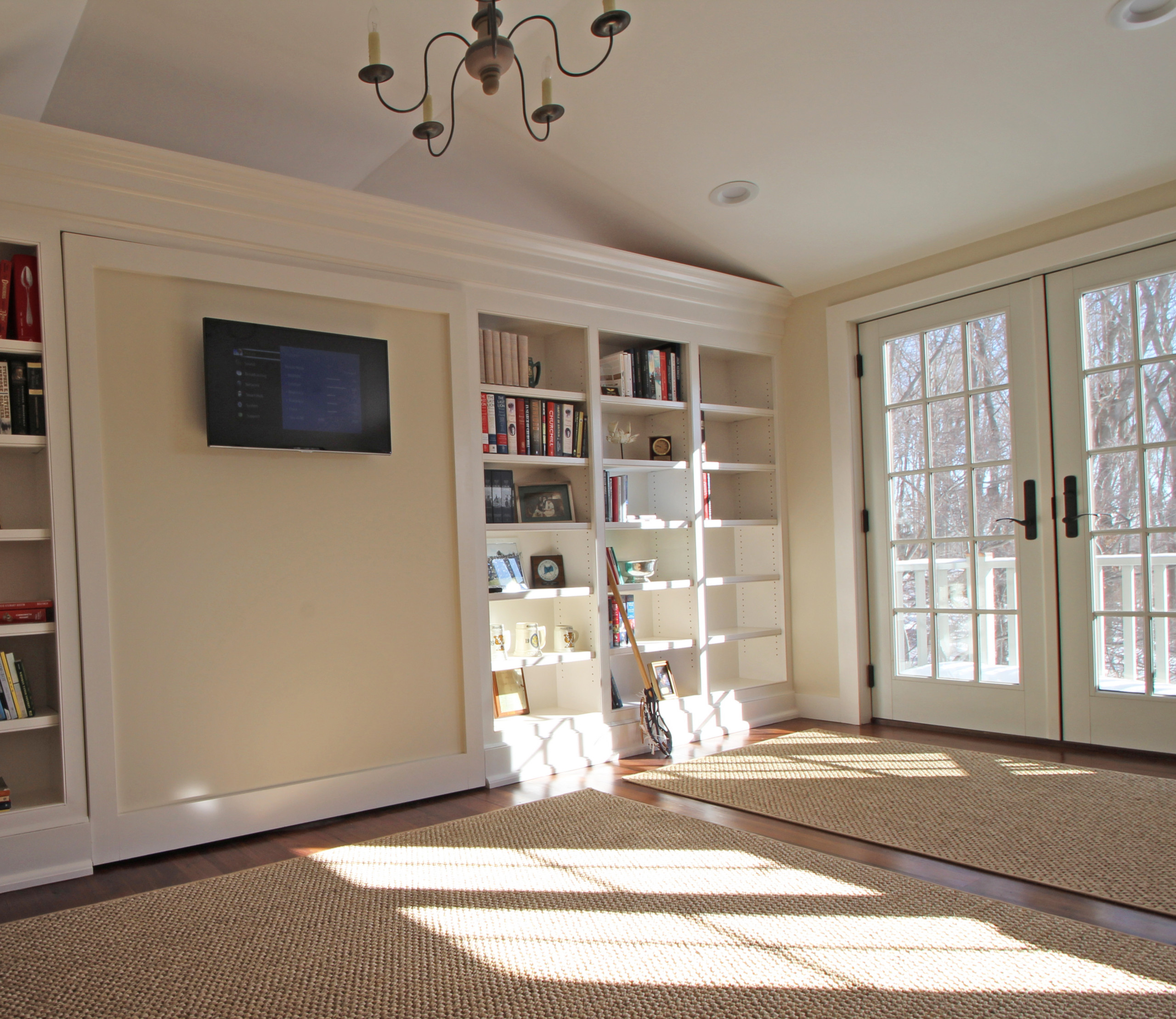 Rotating bookshelf wall