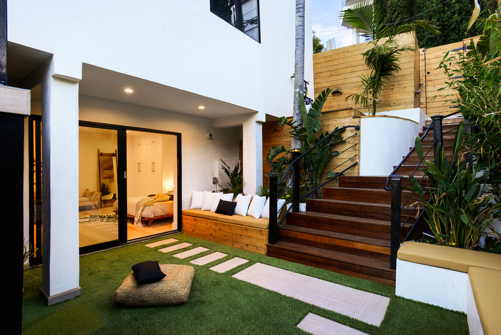 Design ideas for a contemporary side yard garden in Los Angeles with decking.