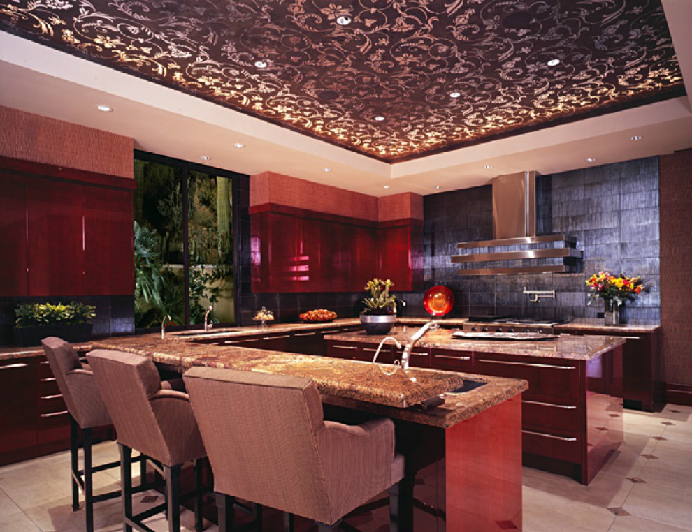 Inspiration for a large contemporary l-shaped beige floor kitchen remodel with an undermount sink, flat-panel cabinets, medium tone wood cabinets, granite countertops, gray backsplash, stainless steel appliances and two islands