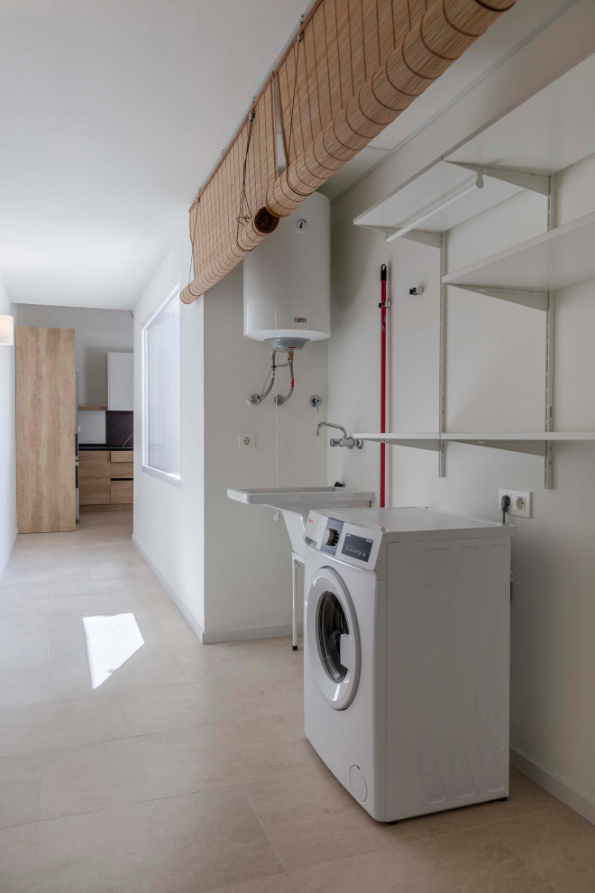 Photo of a mediterranean laundry room in Other.