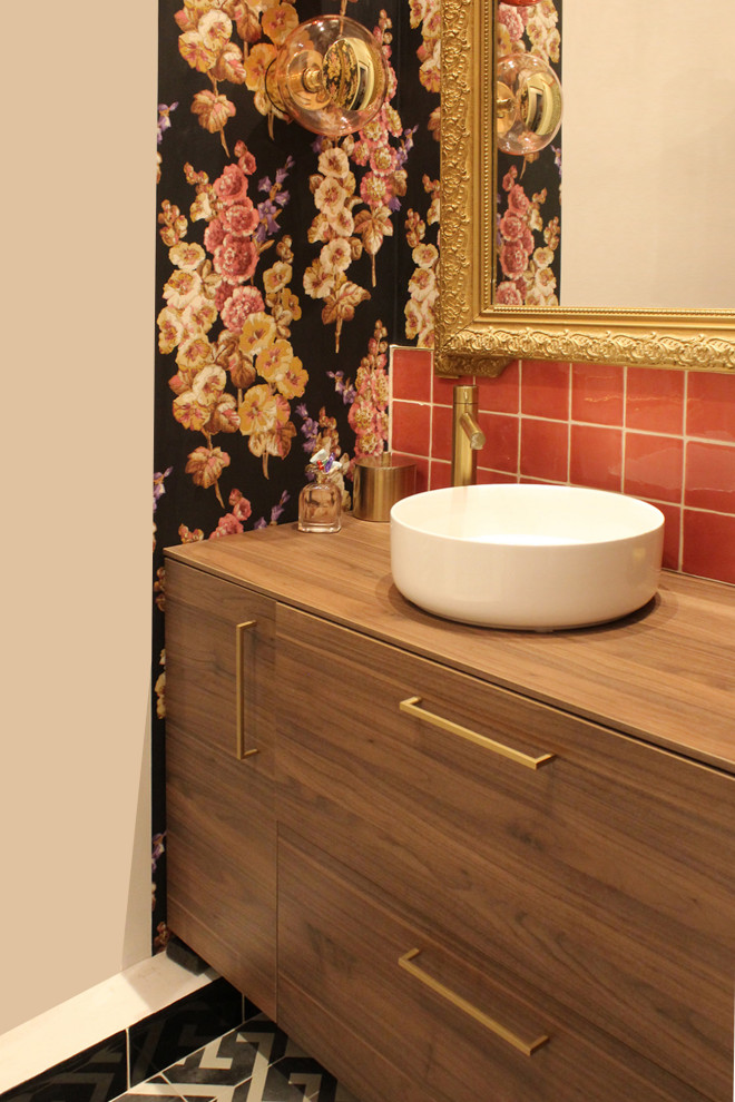 Inspiration for a small traditional 3/4 bathroom in Paris with medium wood cabinets, pink tile, ceramic tile, ceramic floors, a drop-in sink, wood benchtops, beige floor, a hinged shower door, a single vanity and wallpaper.