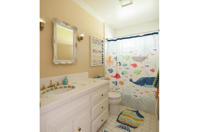 Bathroom of the Week: Calm and Serene in White, Navy and Brass