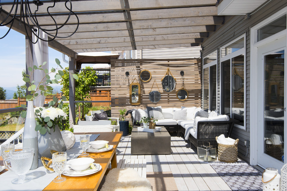 Outdoor kitchen deck - large transitional backyard outdoor kitchen deck idea in Vancouver with a pergola