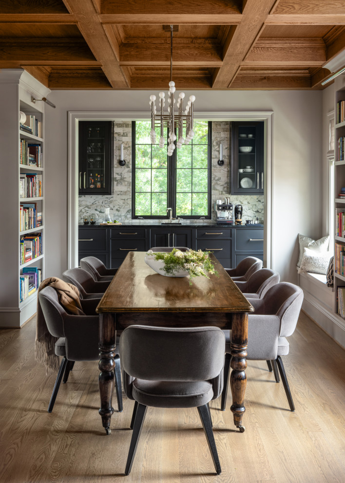 Inspiration for a timeless light wood floor, beige floor, coffered ceiling and wood ceiling dining room remodel in DC Metro with white walls