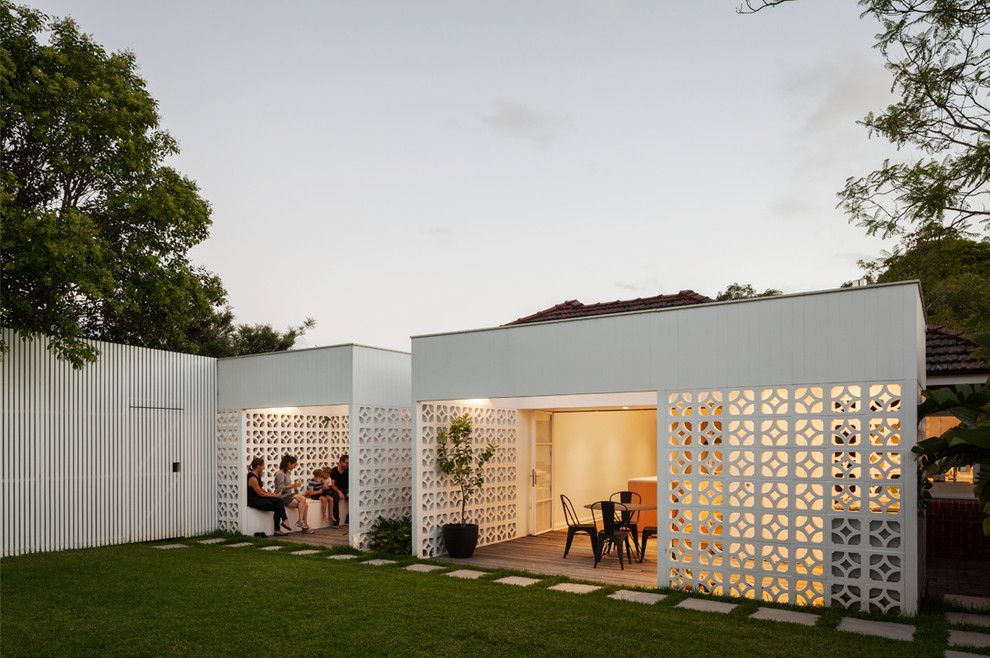 Mid-sized contemporary backyard partial sun garden in Sydney for summer.