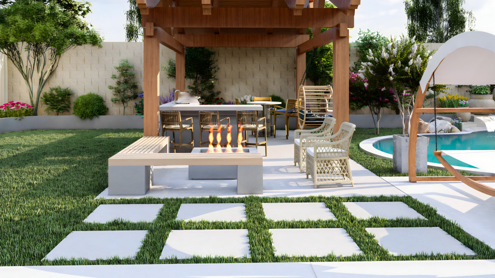 Immagine di un grande patio o portico etnico dietro casa con un focolare, lastre di cemento e un gazebo o capanno
