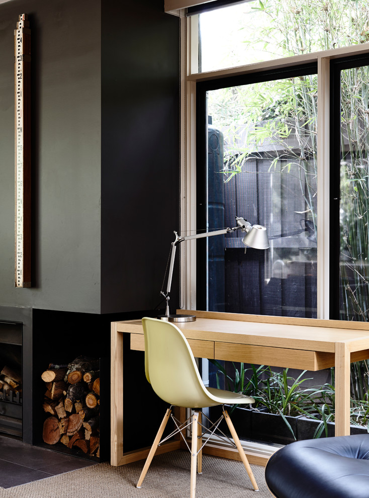 Inspiration for a midcentury home office in Melbourne.