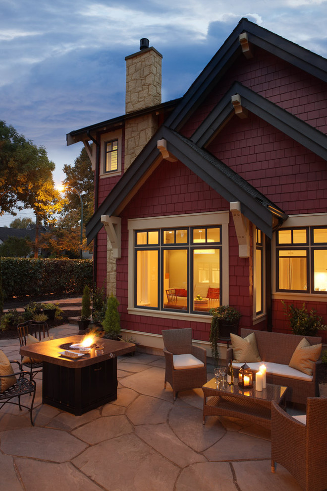 Photo of a traditional patio in Vancouver with a fire feature.
