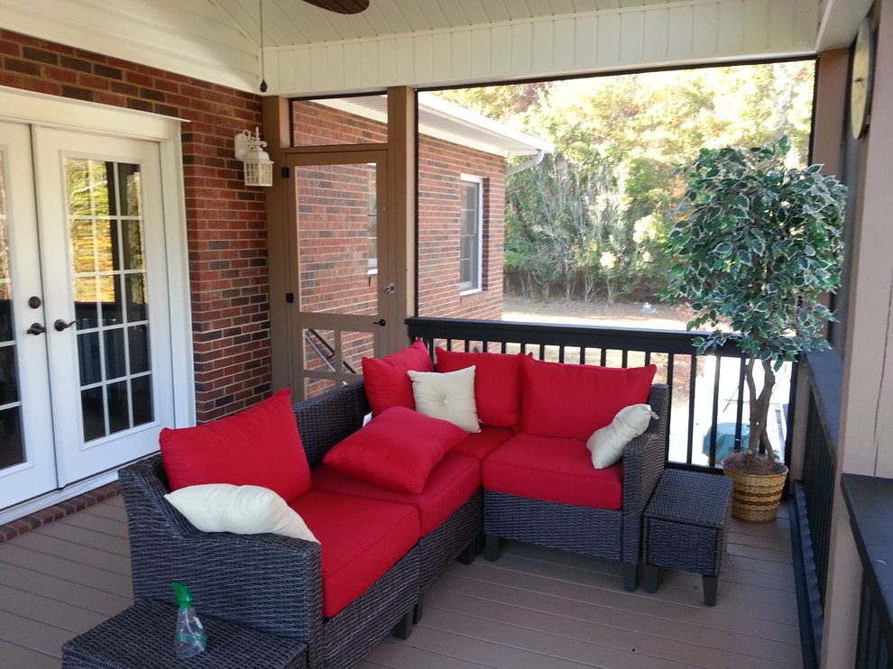 Arts and crafts verandah in Charlotte with decking and a roof extension.