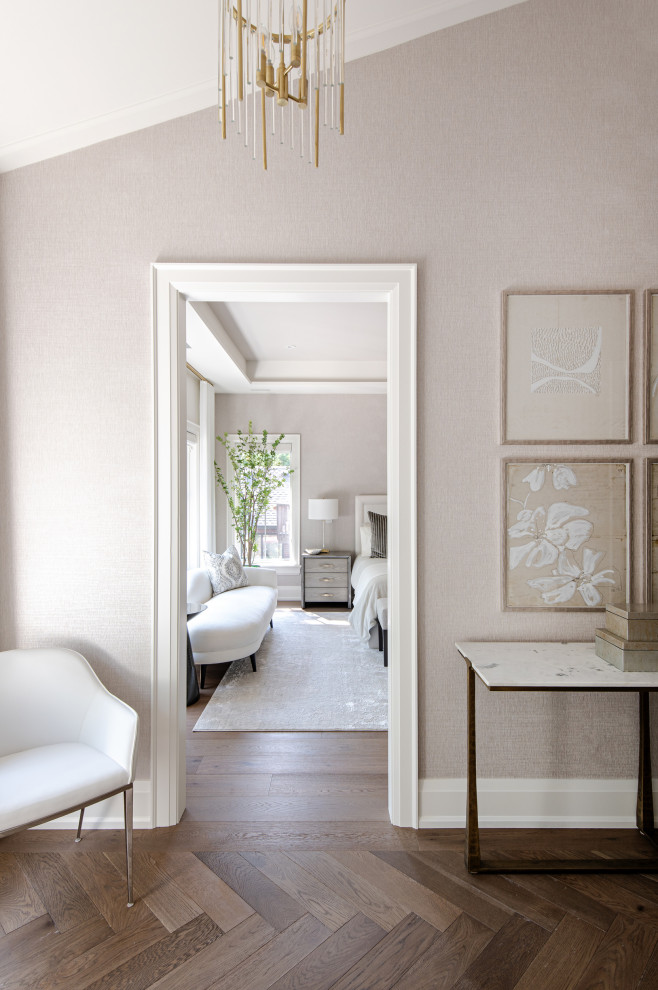 Mid-sized transitional light wood floor and wallpaper hallway photo in Toronto with beige walls